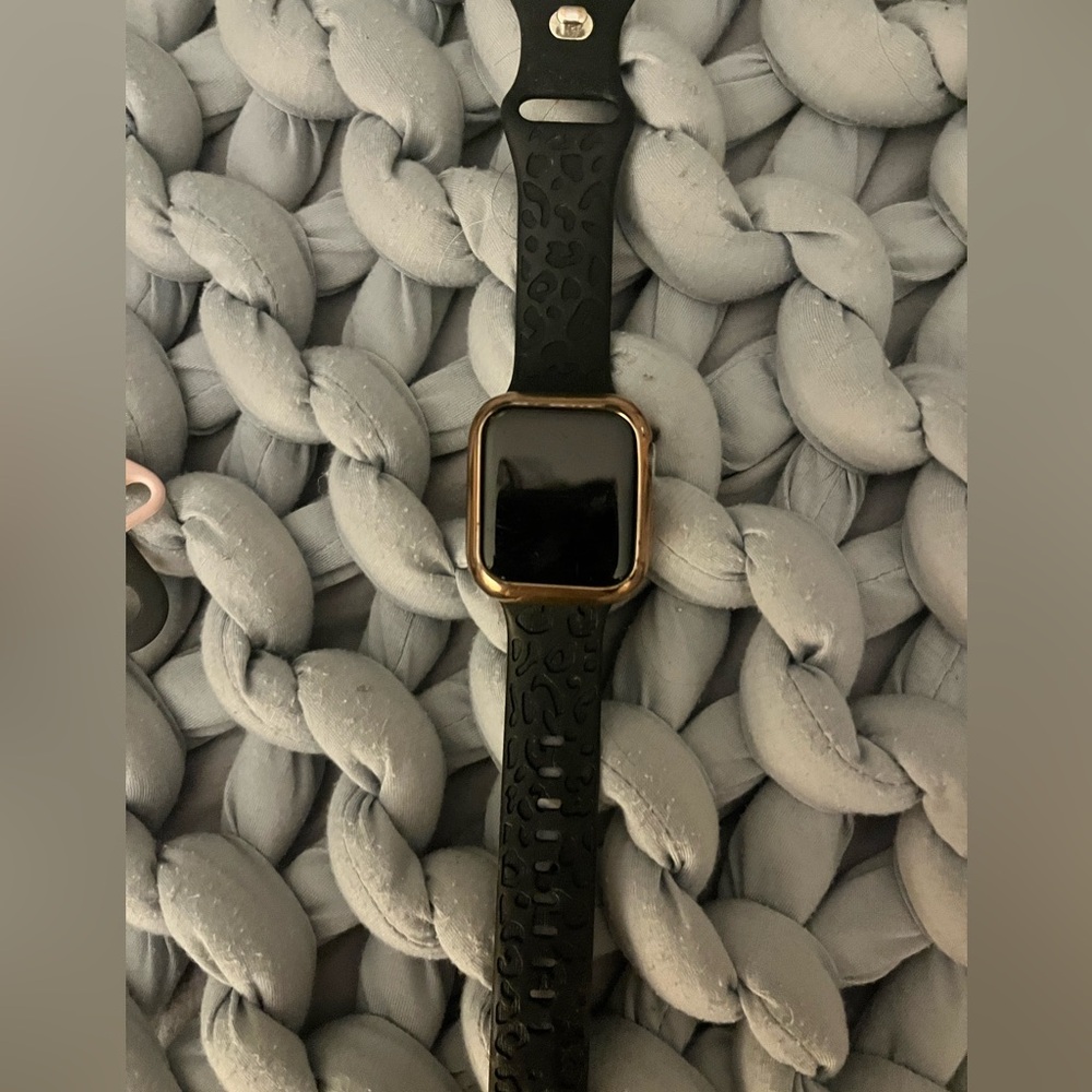 Apple Watch! 4 years old with 5 different bands to swap and a charger and holder